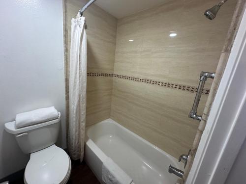Imagen de la habitación del Hotel Palm Inn near Tyler Mall Riverside. Foto 19