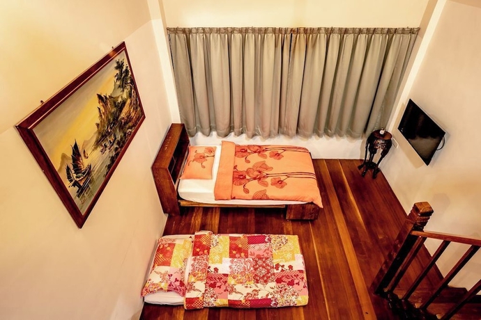 Imagen de la habitación del Hotel Palm Mansion Boutique Suites. Foto 3