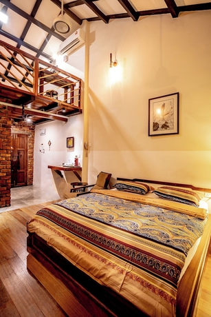 Imagen de la habitación del Hotel Palm Mansion Boutique Suites. Foto 5