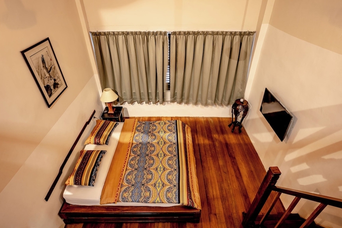 Imagen de la habitación del Hotel Palm Mansion Boutique Suites. Foto 11