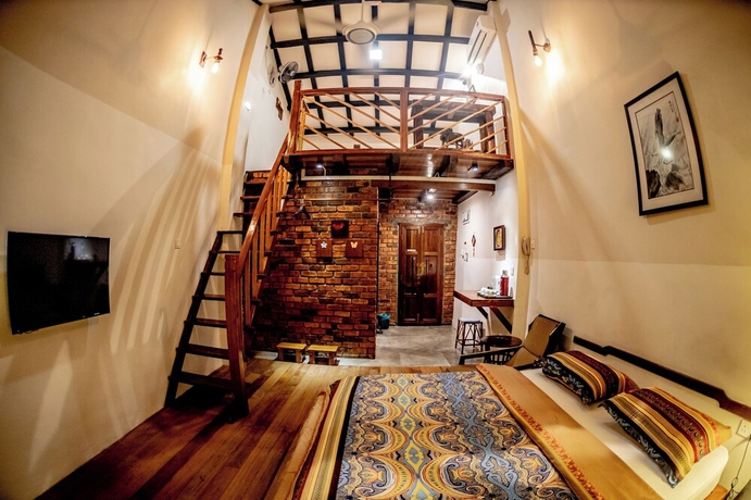 Imagen de la habitación del Hotel Palm Mansion Boutique Suites. Foto 12