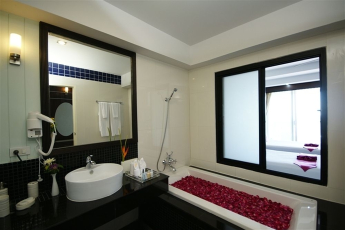 Imagen de la habitación del Hotel Palm Paradise Resort. Foto 7