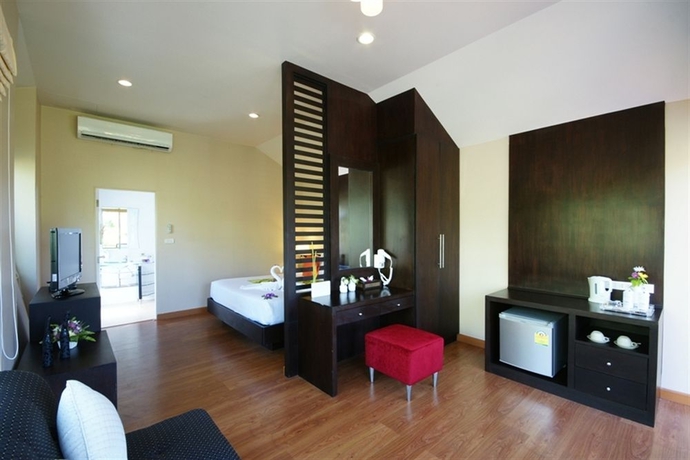 Imagen de la habitación del Hotel Palm Paradise Resort. Foto 9