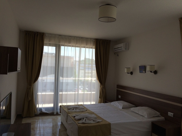 Imagen de la habitación del Hotel Palm Residence Deluxe Studios. Foto 7