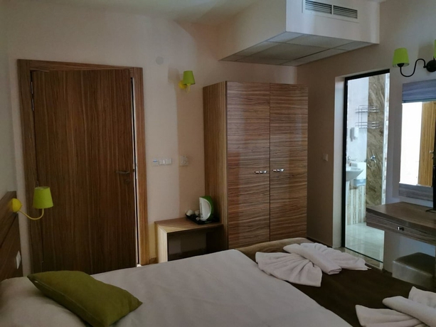 Imagen de la habitación del Hotel Palm Residence Deluxe Studios. Foto 10