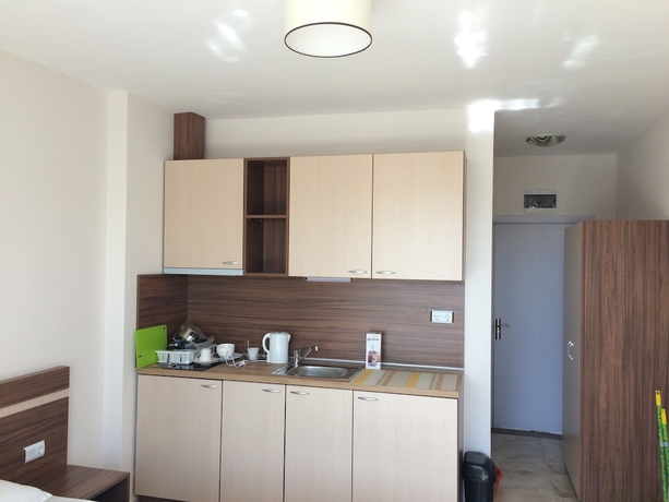 Imagen de la habitación del Hotel Palm Residence Deluxe Studios. Foto 13