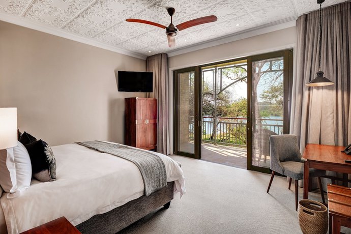 Imagen de la habitación del Hotel Palm River. Foto 10