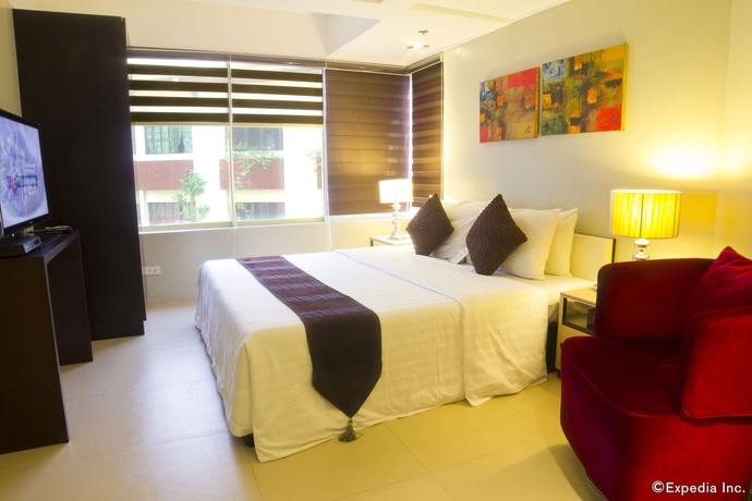 Imagen de la habitación del Hotel Palm Rock Residences. Foto 2