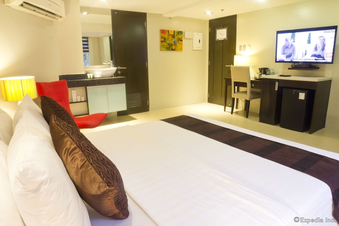 Imagen de la habitación del Hotel Palm Rock Residences. Foto 3