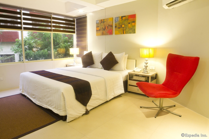Imagen de la habitación del Hotel Palm Rock Residences. Foto 4