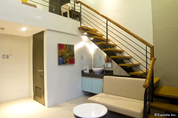 Imagen de la habitación del Hotel Palm Rock Residences. Foto 5
