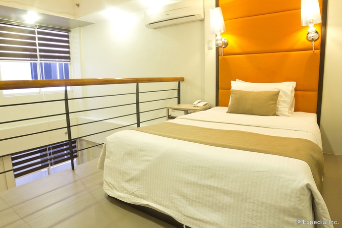 Imagen de la habitación del Hotel Palm Rock Residences. Foto 7