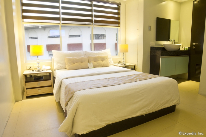 Imagen de la habitación del Hotel Palm Rock Residences. Foto 10