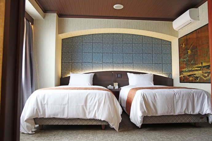 Imagen de la habitación del Hotel Palm Royal Naha Kokusai Street. Foto 8