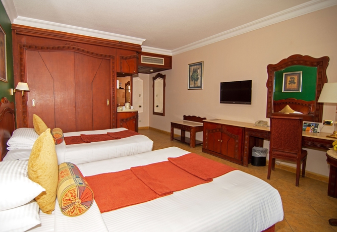 Imagen de la habitación del Hotel Palm Royale Resort - Soma Bay. Foto 8