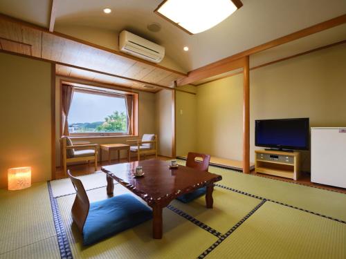 Imagen de la habitación del Hotel Palm Spring. Foto 14