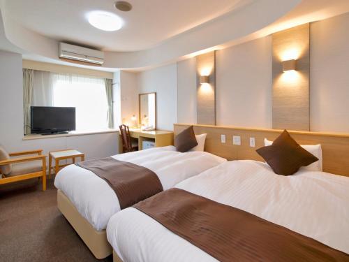 Imagen de la habitación del Hotel Palm Spring, Iwaki. Foto 13