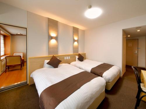 Imagen de la habitación del Hotel Palm Spring, Iwaki. Foto 16