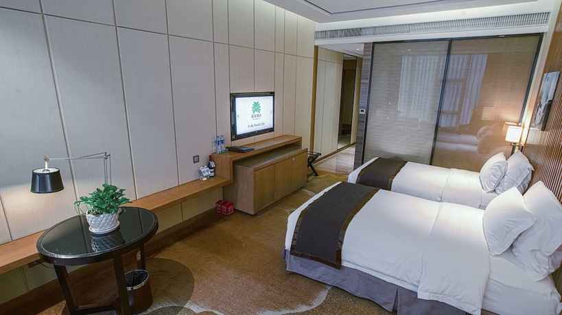 Imagen de la habitación del Hotel Palm Spring, Zhuhai. Foto 2