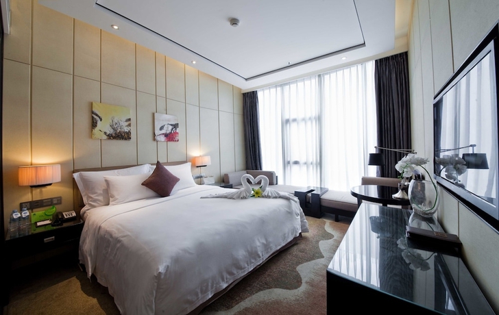 Imagen de la habitación del Hotel Palm Spring, Zhuhai. Foto 9