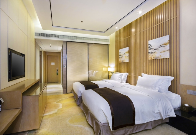 Imagen de la habitación del Hotel Palm Spring, Zhuhai. Foto 10