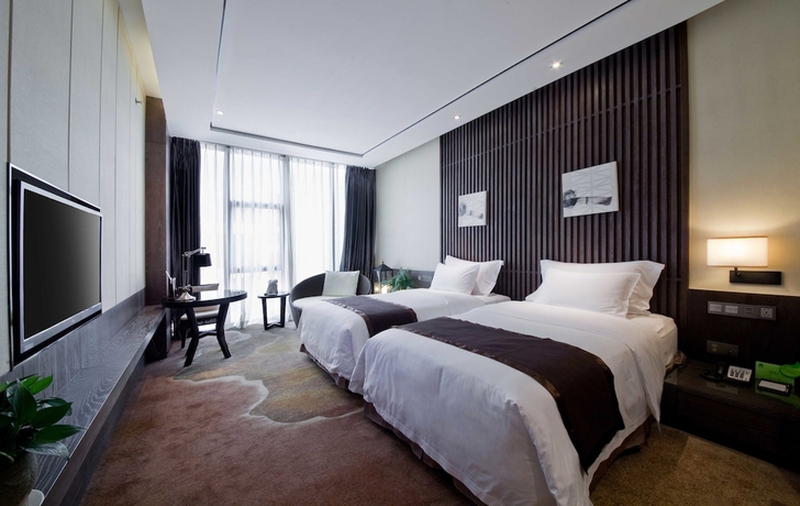 Imagen de la habitación del Hotel Palm Spring, Zhuhai. Foto 11