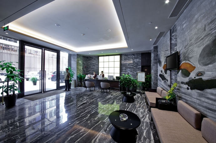 Imagen de los interiores del Hotel Palm Spring, Zhuhai. Foto 19
