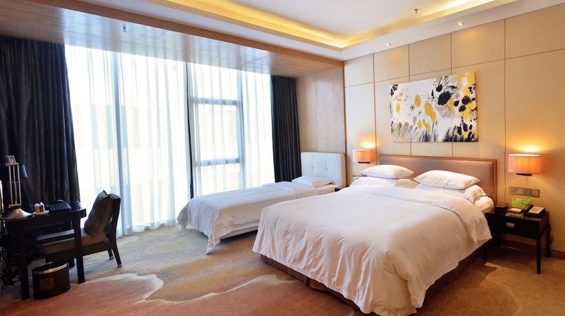 Imagen de la habitación del Hotel Palm Spring, Zhuhai. Foto 16