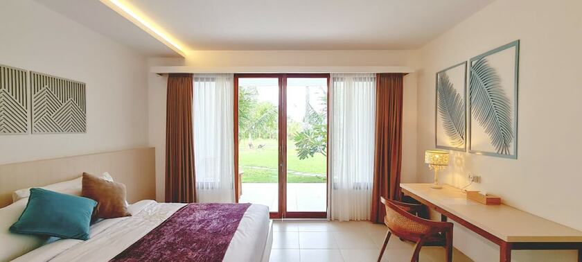 Imagen de la habitación del Hotel Palm Springs Bali Resorts. Foto 8