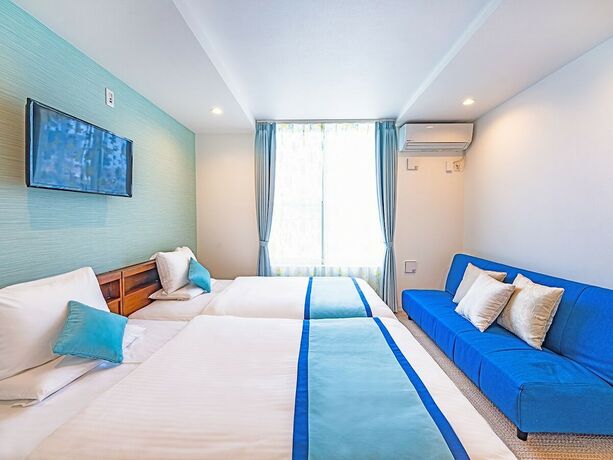 Imagen de la habitación del Hotel Palm Springs Miyakojima Resort. Foto 12