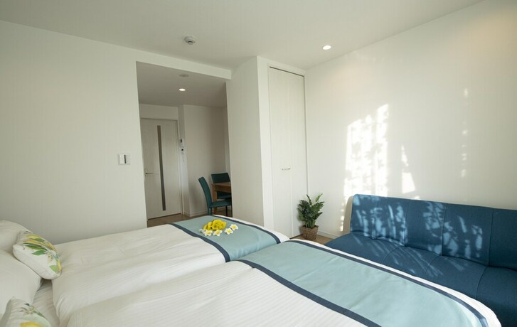 Imagen de la habitación del Hotel Palm Springs Miyakojima Resort. Foto 20