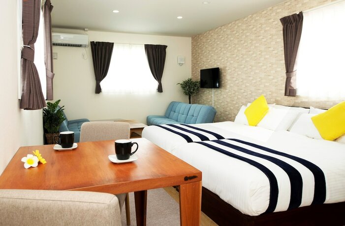 Imagen de la habitación del Hotel Palm Springs Miyakojima Resort. Foto 23