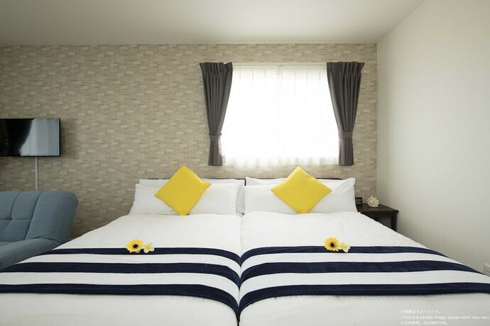 Imagen de la habitación del Hotel Palm Springs Miyakojima Resort. Foto 24