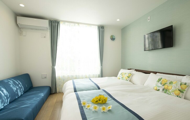 Imagen de la habitación del Hotel Palm Springs Miyakojima Resort. Foto 31