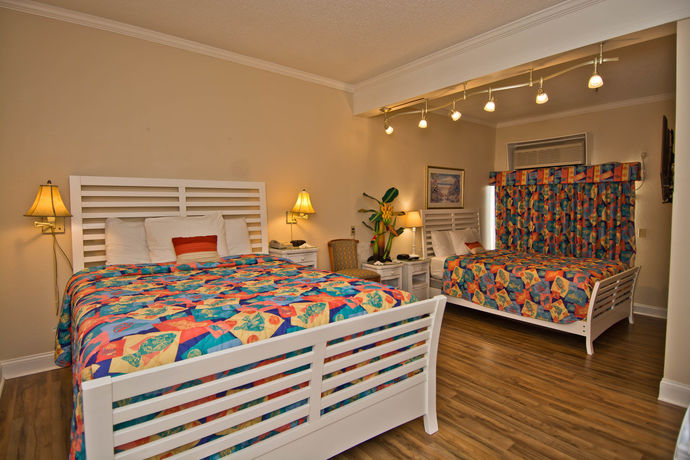 Imagen de la habitación del Hotel Palm Suites. Foto 9