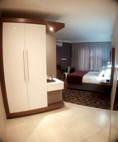 Imagen de la habitación del Hotel Palm Swift Luxury Accommodation. Foto 14