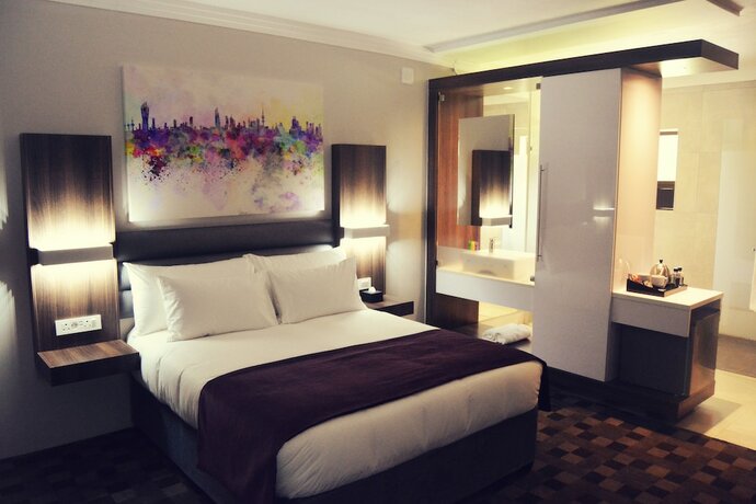 Imagen de la habitación del Hotel Palm Swift Luxury Accommodation. Foto 15