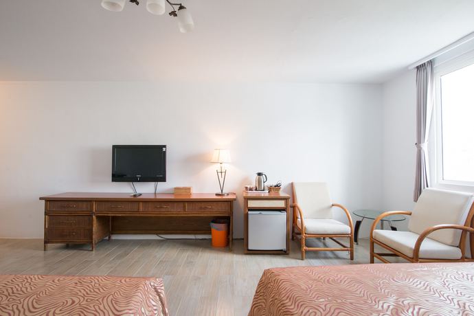 Imagen de la habitación del Hotel Palm Tree. Foto 7