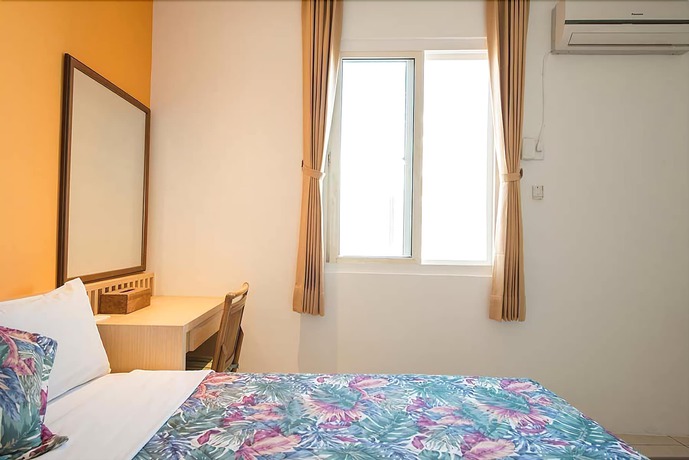 Imagen de la habitación del Hotel Palm Tree. Foto 15