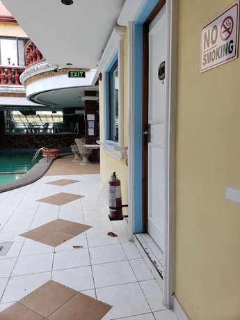 Imagen de la habitación del Hotel Palm Tree Resort and Restaurant. Foto 11