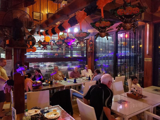 Imagen del bar/restaurante del Hotel Palm Tree Resort and Restaurant. Foto 6