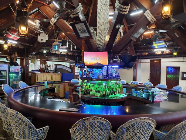 Imagen del bar/restaurante del Hotel Palm Tree Resort and Restaurant. Foto 7