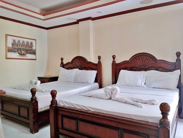Imagen de la habitación del Hotel Palm Tree Resort and Restaurant. Foto 14