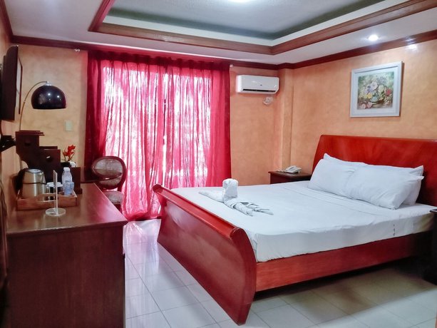Imagen de la habitación del Hotel Palm Tree Resort and Restaurant. Foto 16