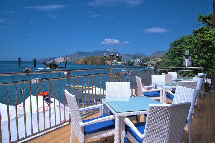 Imagen del bar/restaurante del Hotel Palm Tree Resort and Restaurant. Foto 8