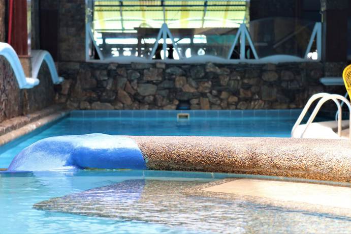 Imagen de la piscina del Hotel Palm Tree Resort and Restaurant. Foto 20