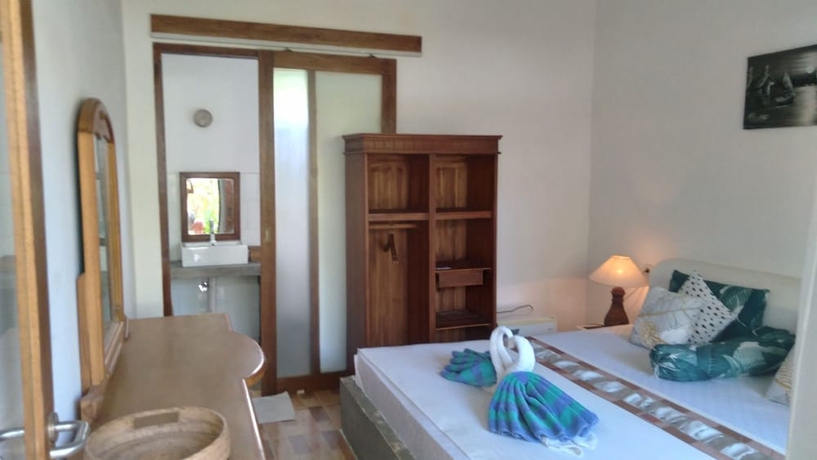Imagen de la habitación del Hotel Palm Trees Villas. Foto 8