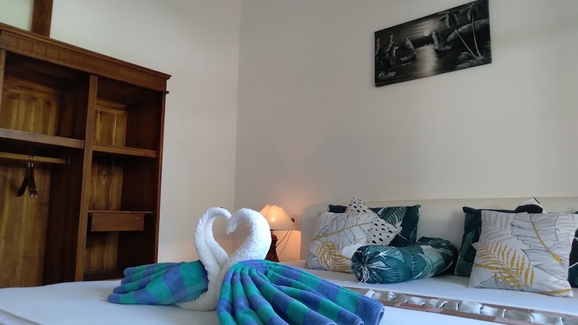 Imagen de la habitación del Hotel Palm Trees Villas. Foto 10