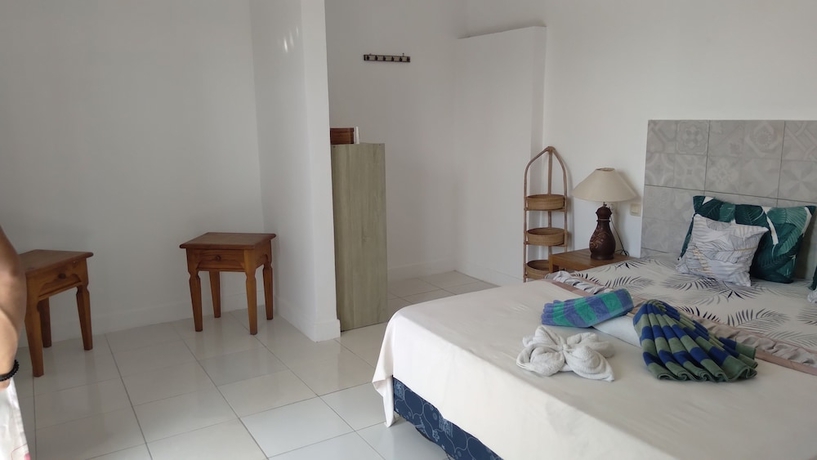 Imagen de la habitación del Hotel Palm Trees Villas. Foto 13