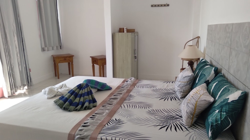 Imagen de la habitación del Hotel Palm Trees Villas. Foto 14